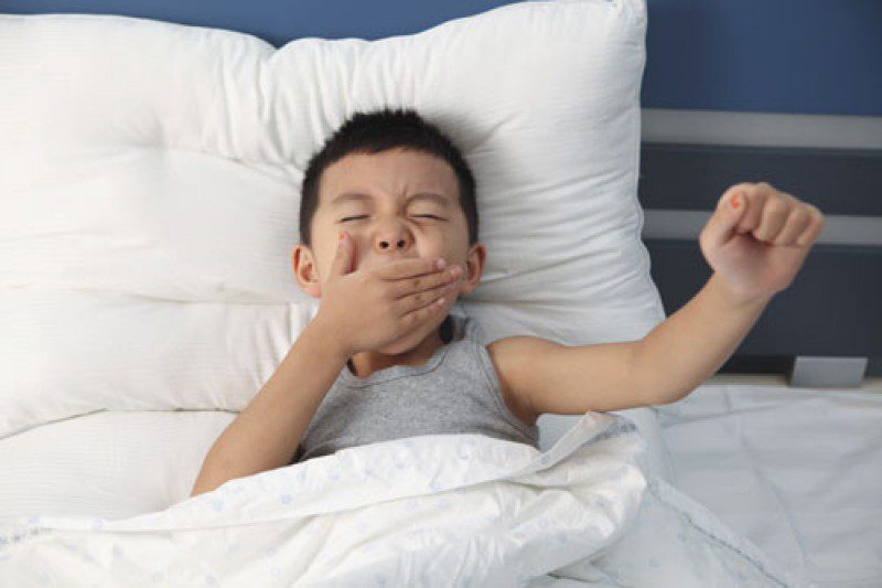 a boy waking up
